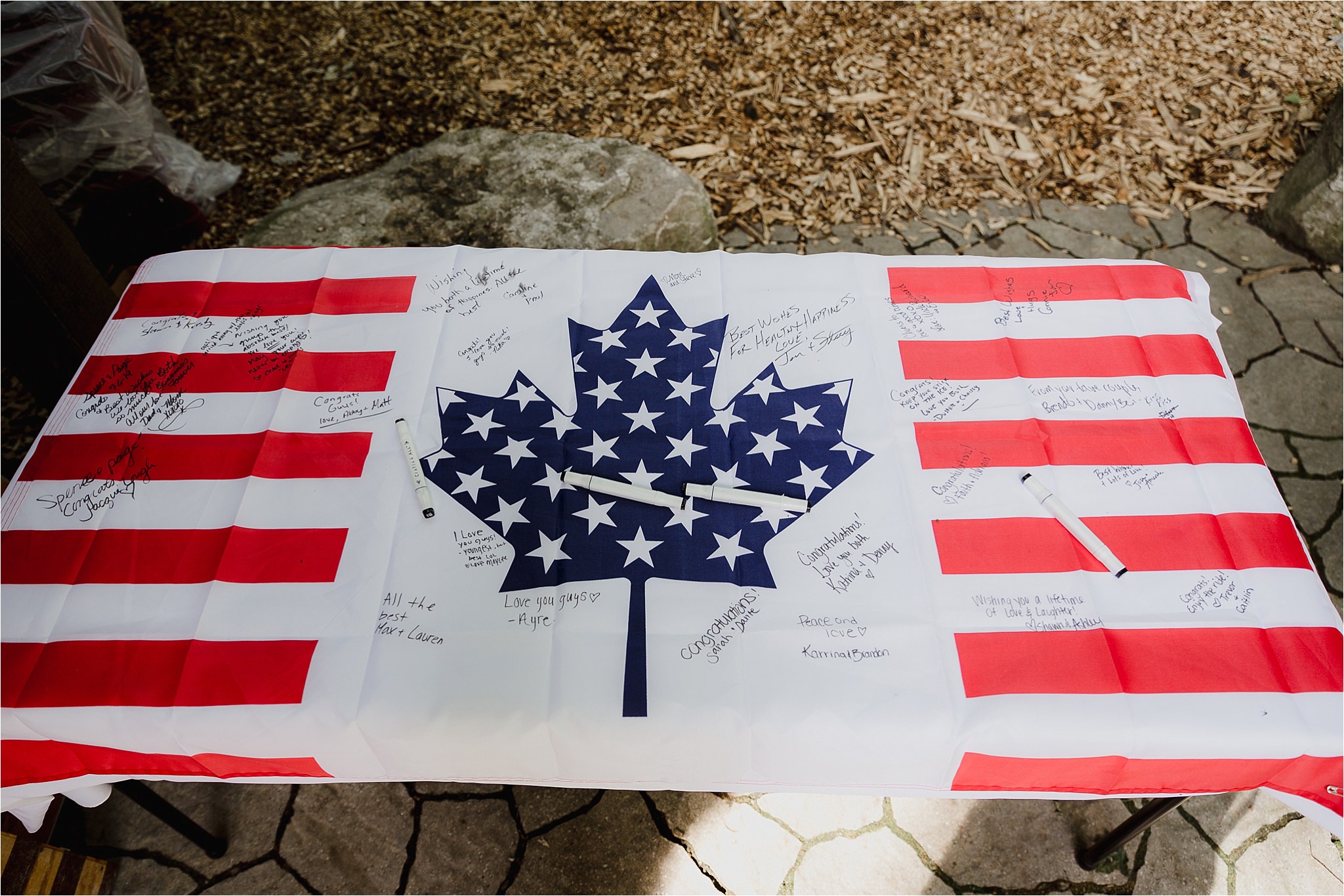 Sonia V Photography, The Clearing reception wedding venue, Canadian American flag guest book idea