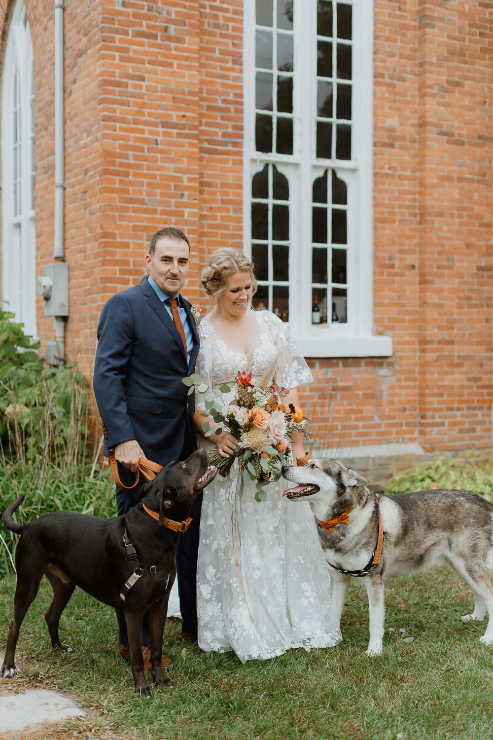 Dogs walk bride down the aisle Rainy-fall-wedding-at-The-Knox-Merickville-by- Sonia V Photo - Documentary Style Candid Photographer - Ottawa Ontario Kemptville Destination Photographer - Authentic Colour Photography - Wedding Photographer - Branding Photographer - Small Business Headshots - Engagement Photos - Family Portraits - Lifestyle
