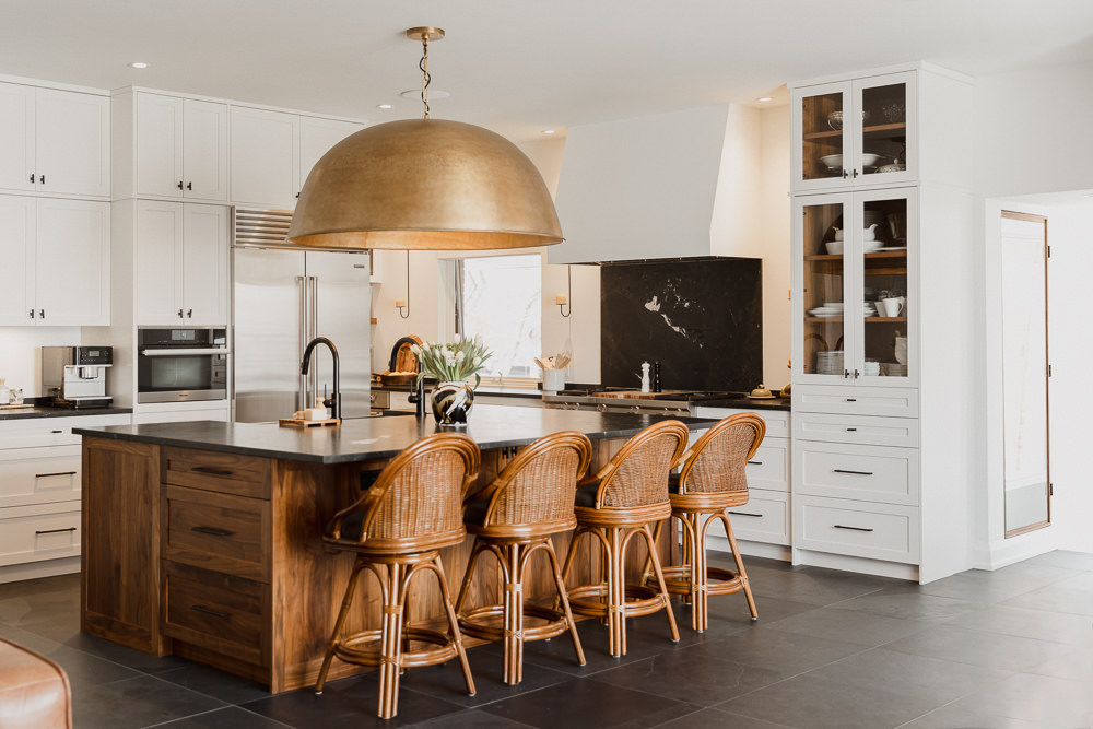 Kitchen with large island lamp and rattan stoolsIndian inspired home in the Glebe Ottawa Ontario Studio-Kahaani-Ottawa-interior-design-inspiration-ideas-brand-photos-by-Sonia-V-Photography