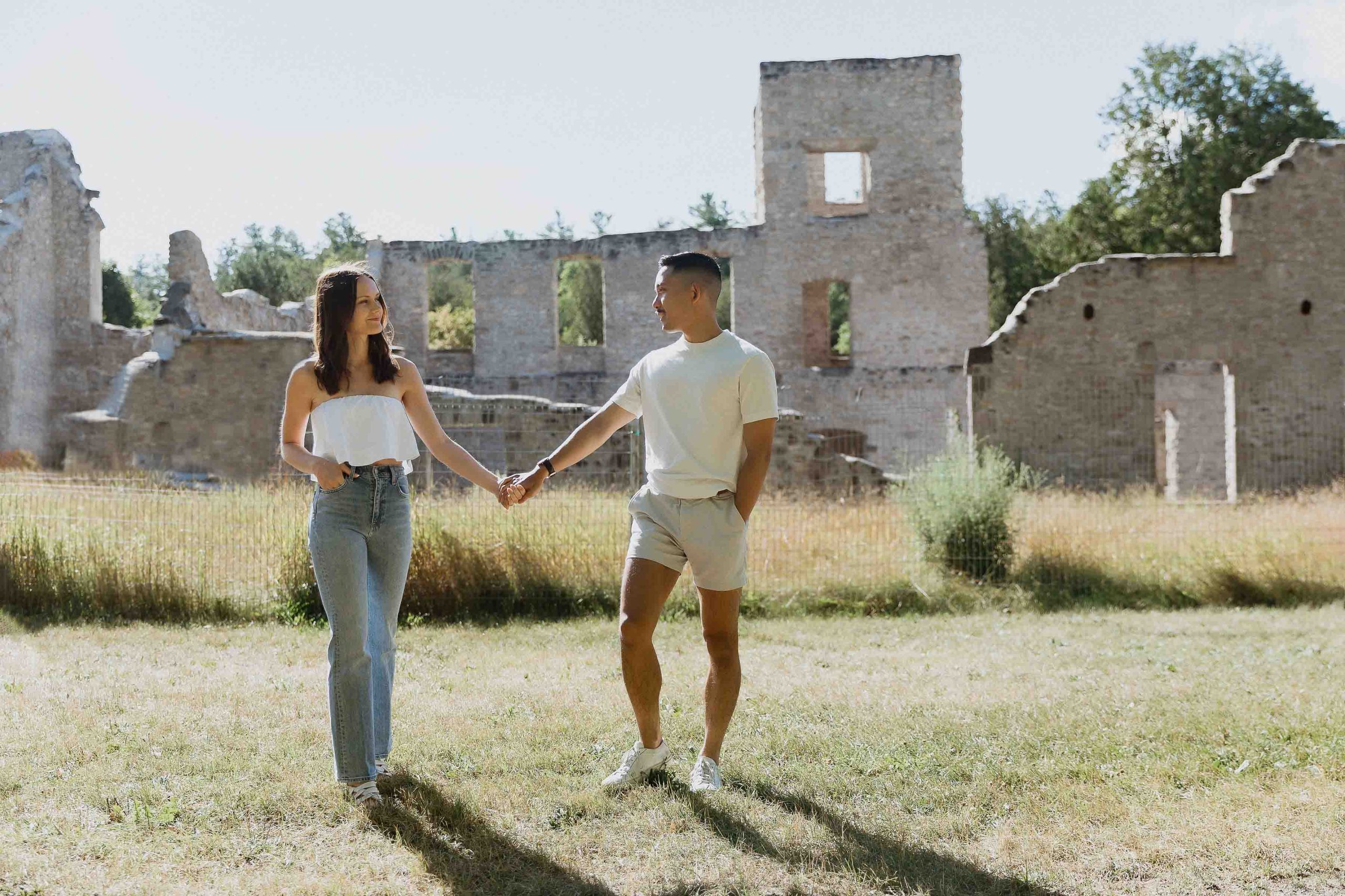 Engagement photos at Guelph conservation area, guelph lake, harris mill ruins, Sonia V Photography couple holding hands in front of ruins
