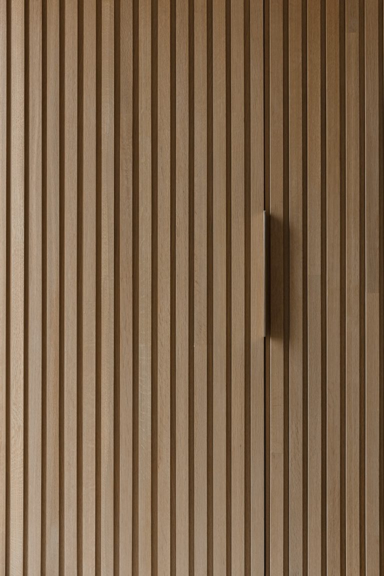 Unique Kitchen, Stunning Glass Railing, and Hidden Closet in Slat Wall ...