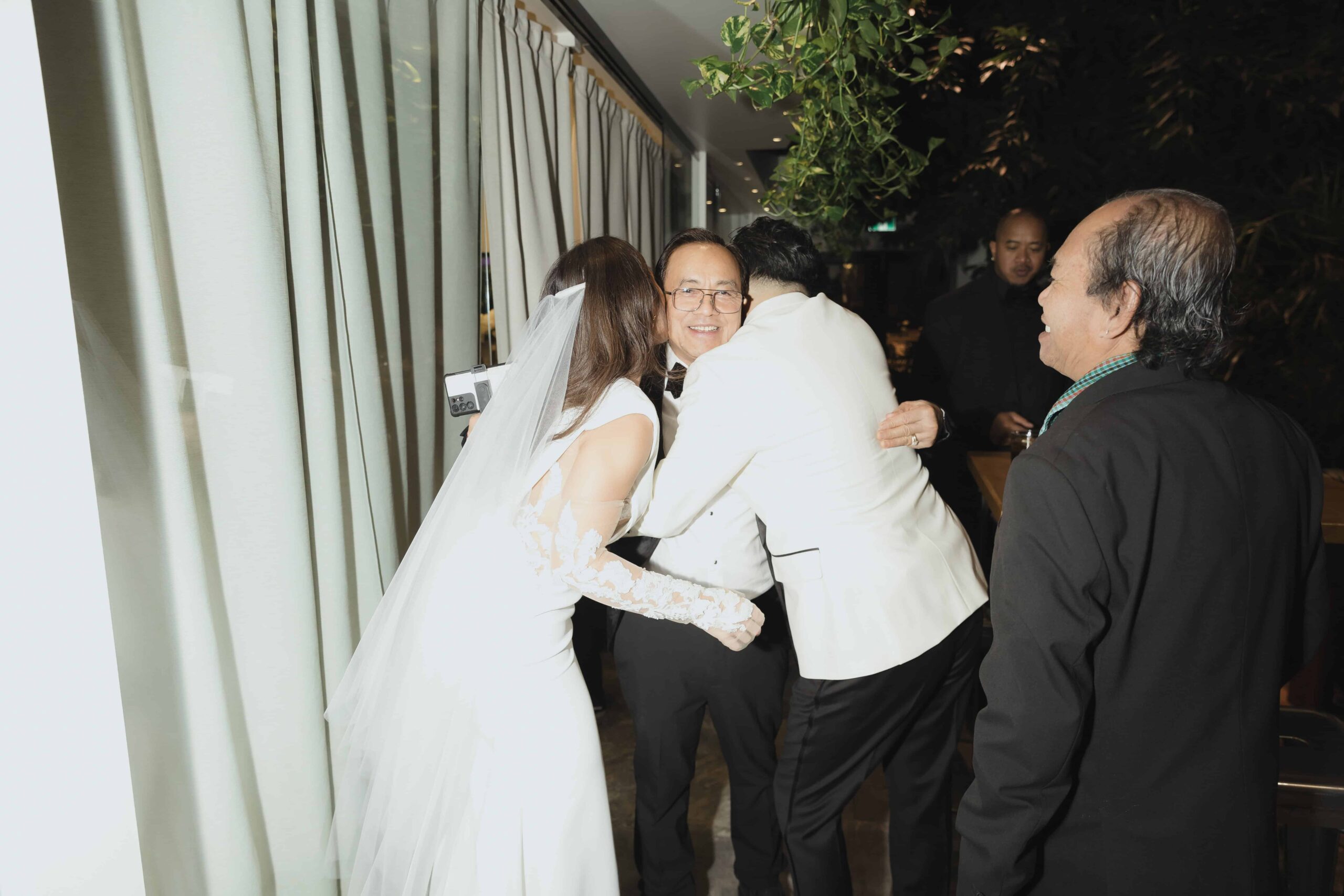 Snowy Winter Wedding With an All Black Dress Code at a Greenhouse - Sonia V Photography