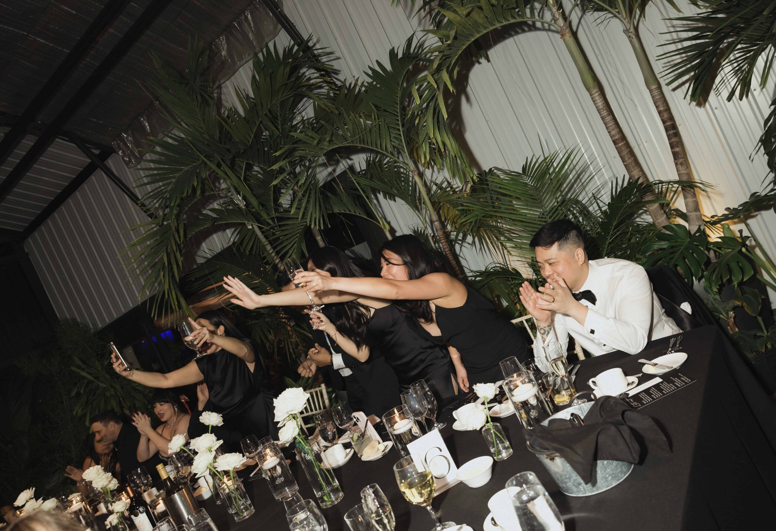 Snowy Winter Wedding With an All Black Dress Code at a Greenhouse - Sonia V Photography