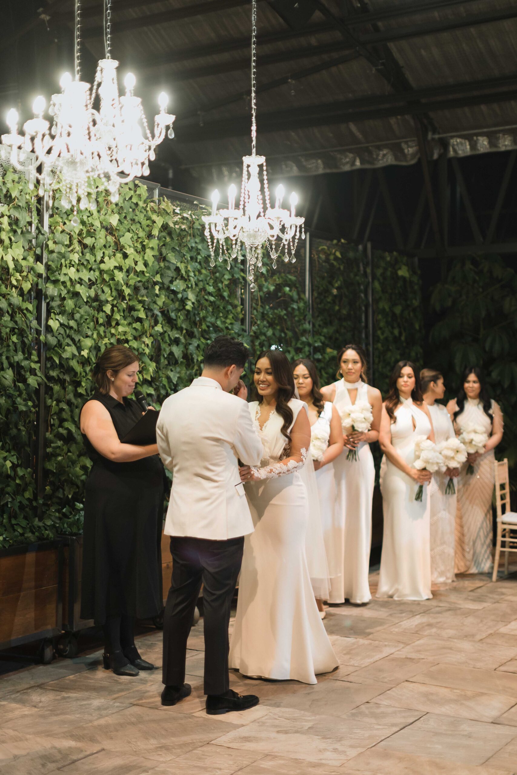 Snowy Winter Wedding With an All Black Dress Code at a Greenhouse - Sonia V Photography