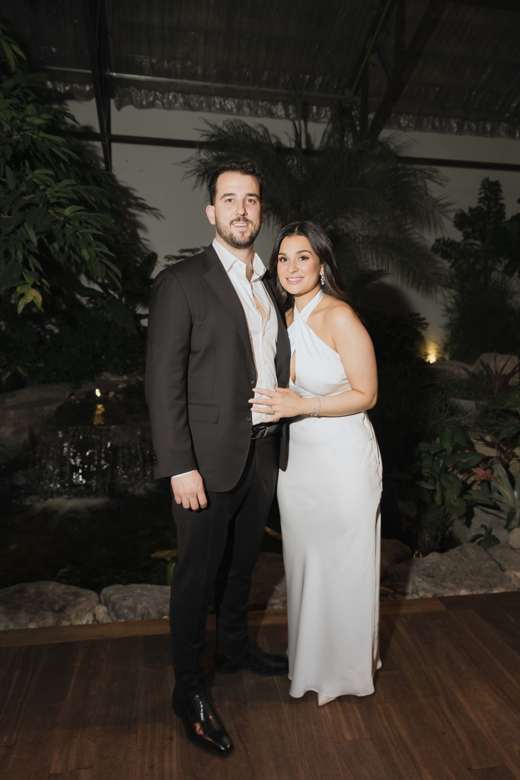 Snowy Winter Wedding With an All Black Dress Code at a Greenhouse - Sonia V Photography