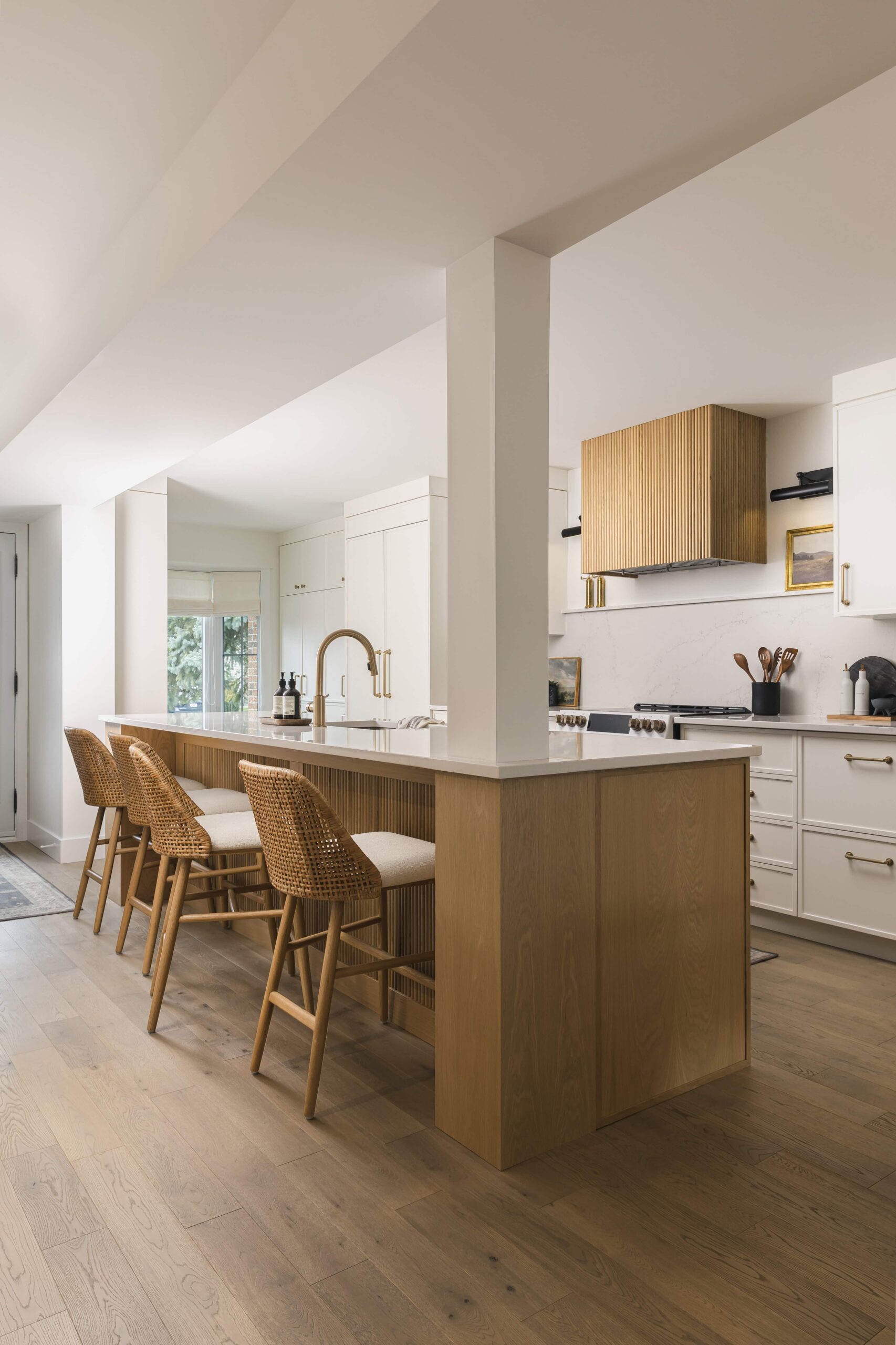 Warm Open-Concept Kitchen & Bath with Brass Accents