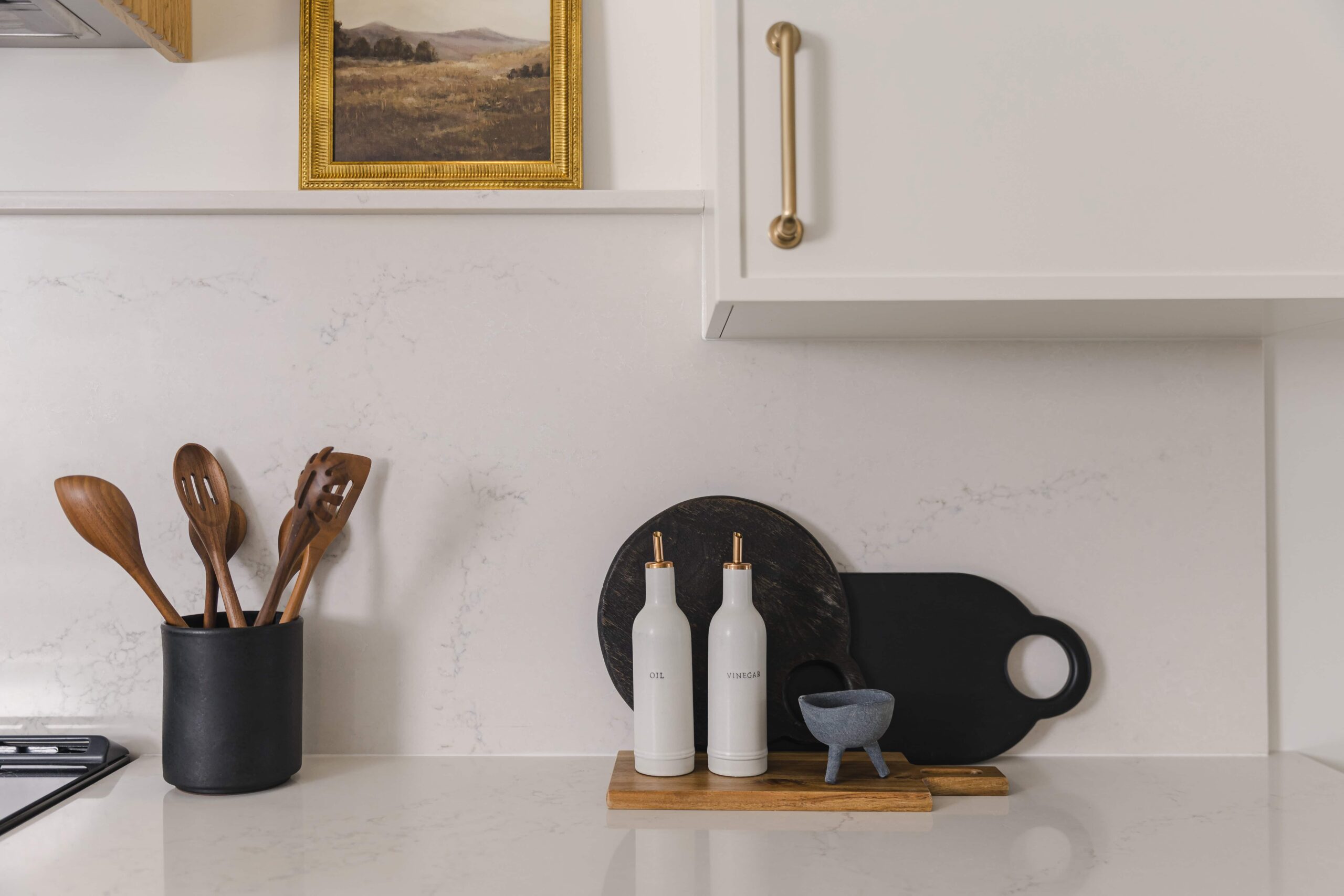 Warm Open-Concept Kitchen & Bath with Brass Accents - Sonia V Photography