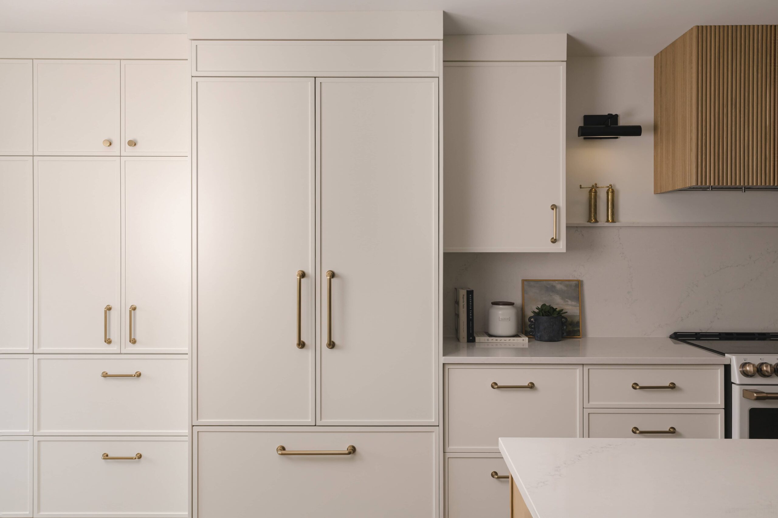 Warm Open-Concept Kitchen & Bath with Brass Accents - Sonia V Photography