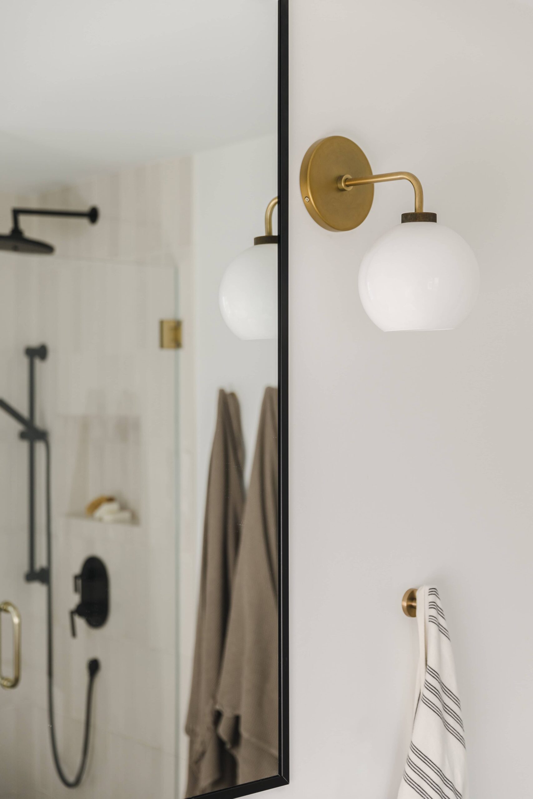 Warm Open-Concept Kitchen & Bath with Brass Accents - Sonia V Photography