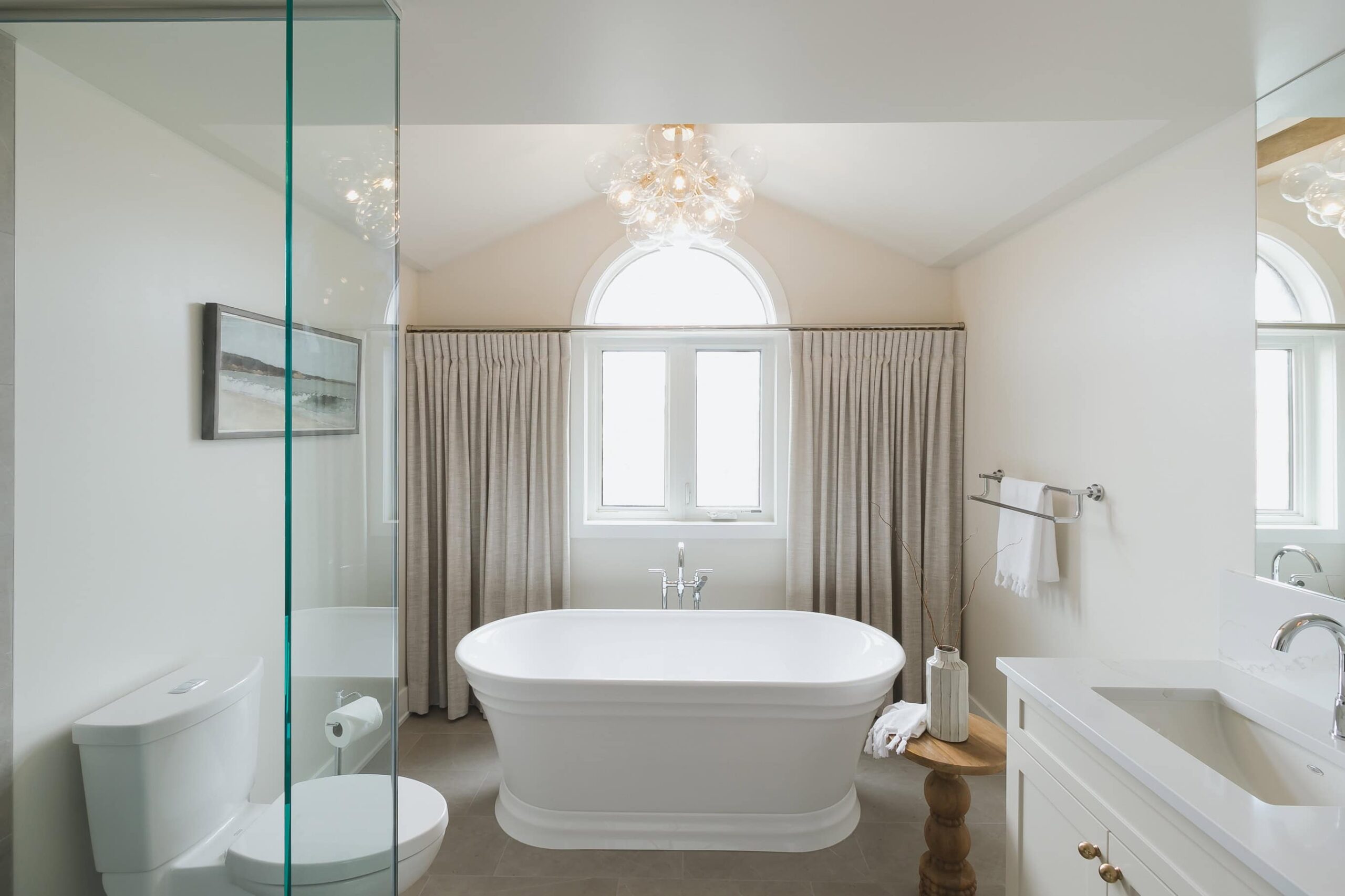 Neutral Bathroom Featuring A Bubble Chandelier - Sonia V Photography