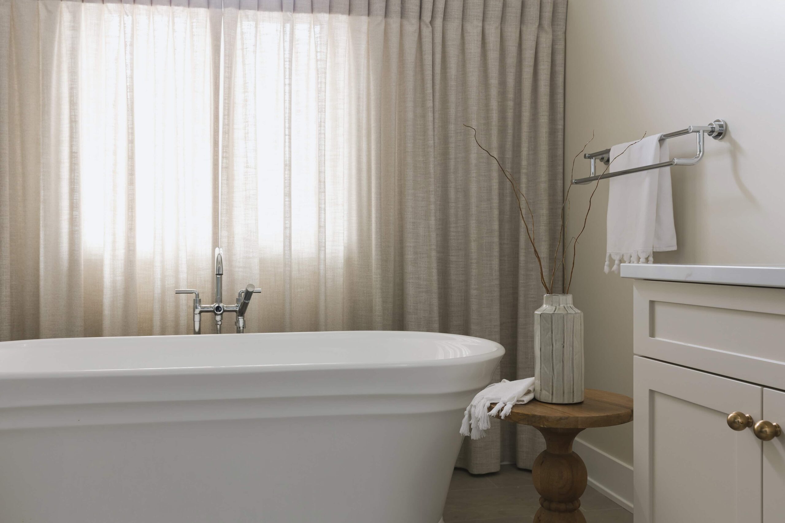 Neutral Bathroom Featuring A Bubble Chandelier - Sonia V Photography