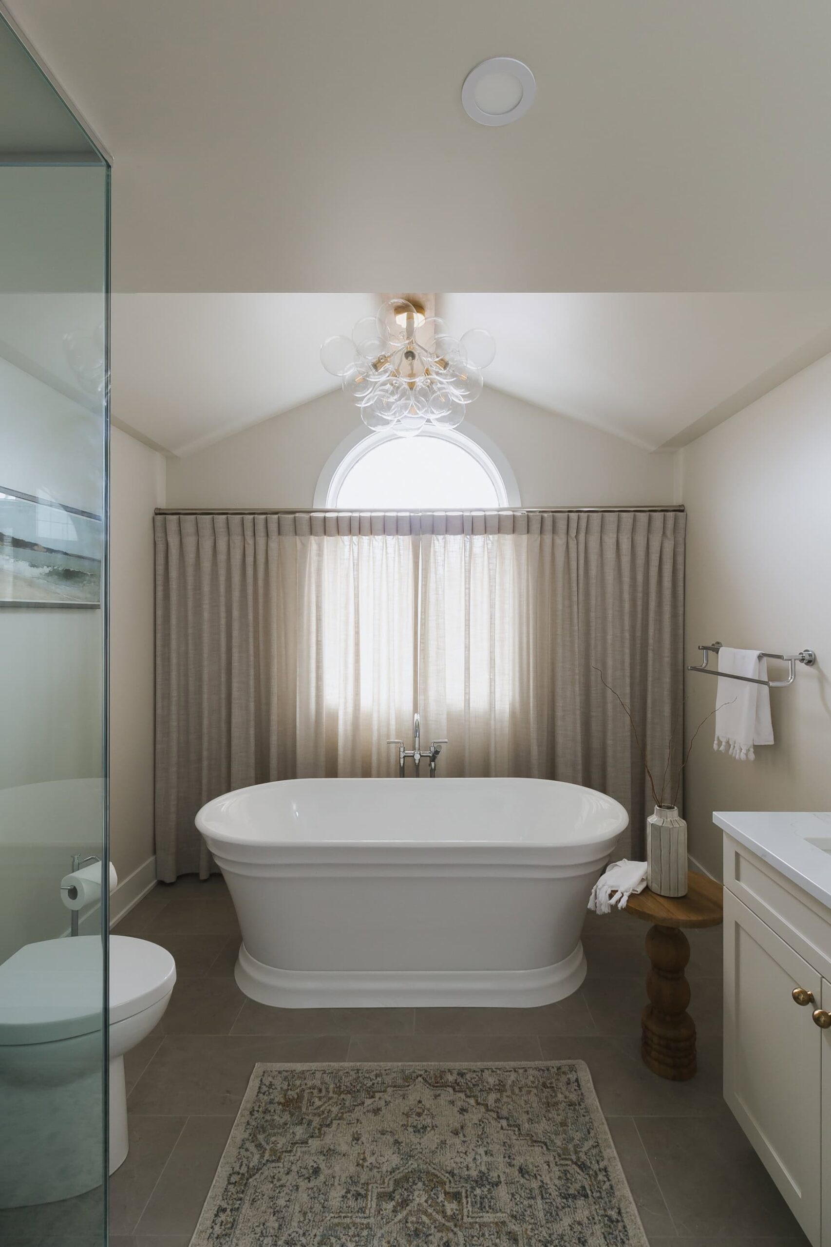 Neutral Bathroom Featuring A Bubble Chandelier - Sonia V Photography